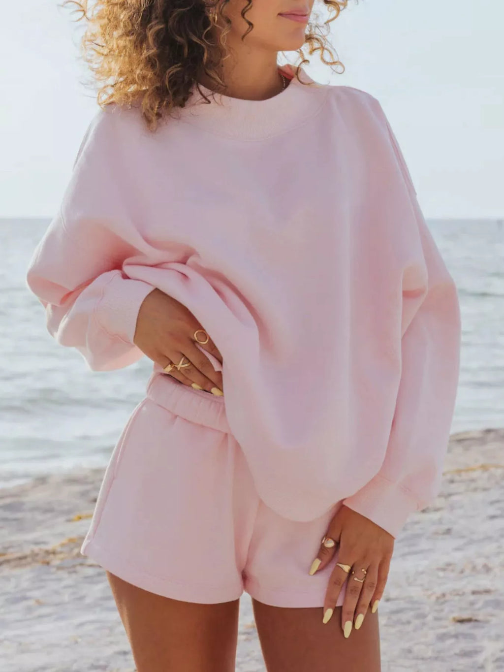 Plush Fashion Hub relaxed fit round neck sweatshirt and matching shorts set, casual loungewear for comfortable style.