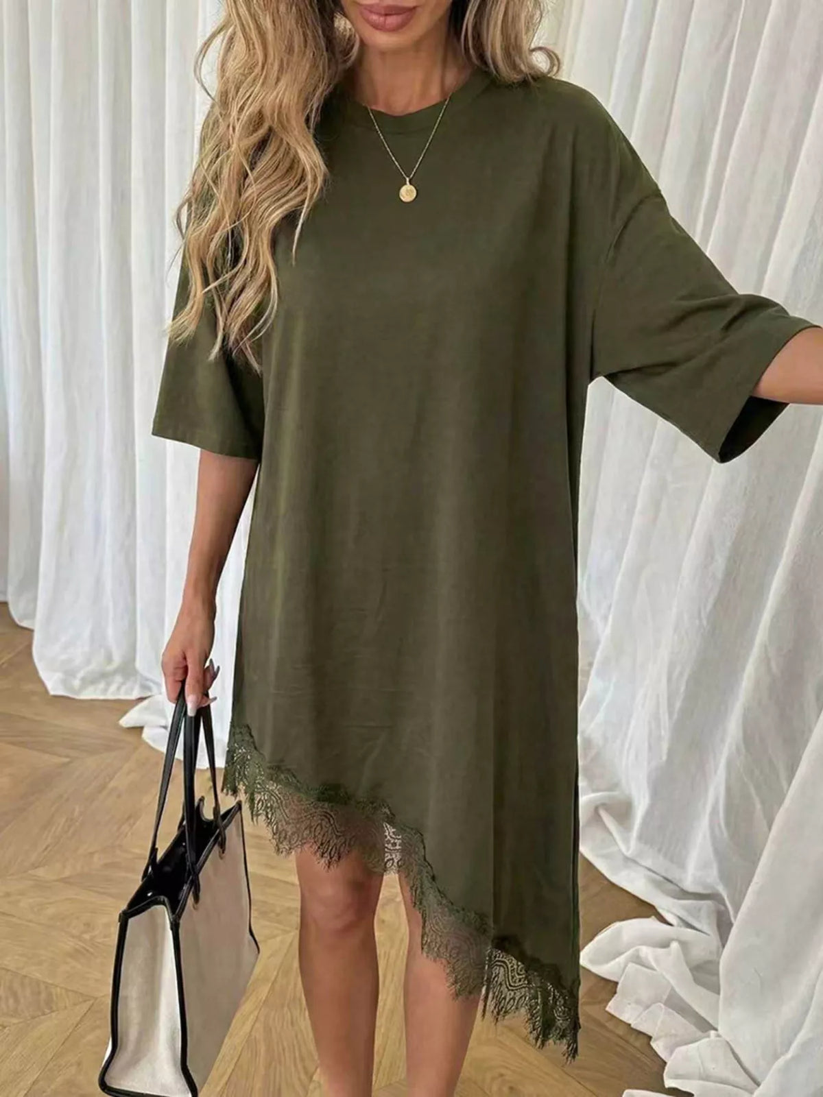 Lace trim asymmetrical hem T-shirt dress by Plush Fashion Hub, featuring a casual shirt dress style with decorative lace details.