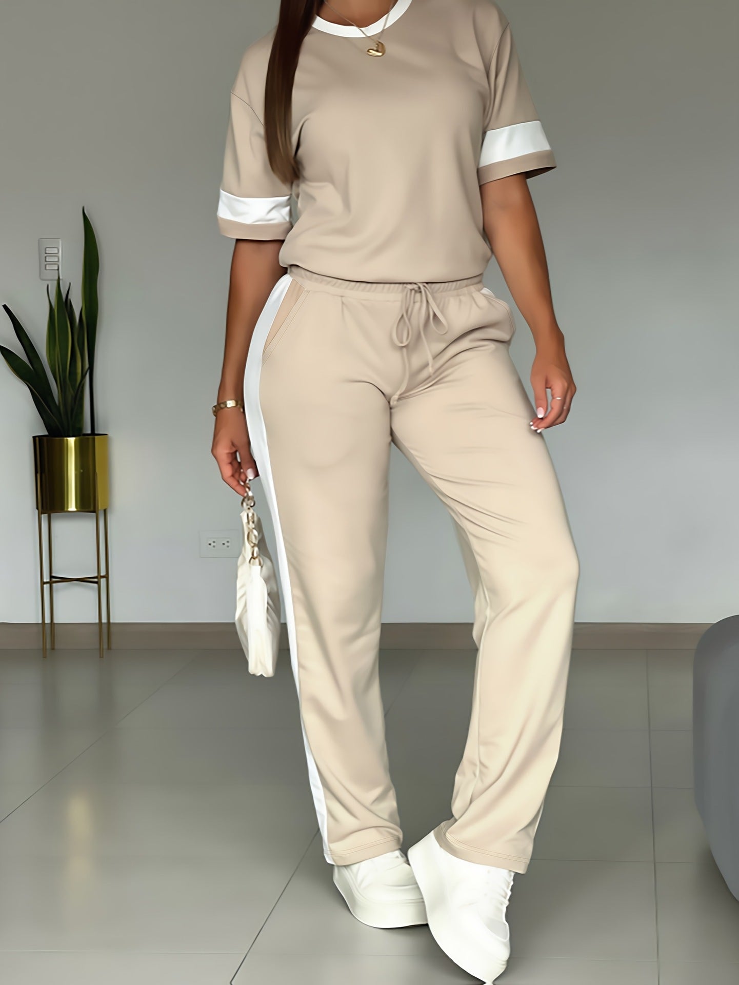 Plush Fashion Hub women's casual sportswear suit featuring a stylish, comfortable fit with modern design and sporty fabric.