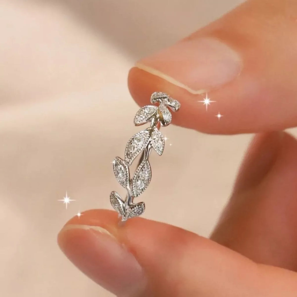 Sterling silver leaf ring with detailed leaf design, crafted from 925 silver, showcasing natural botanical style.