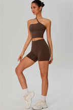 Fitglutes activewear, one-shoulder crop top and shorts 2-piece set, stylish gymwear and workout clothes for women.