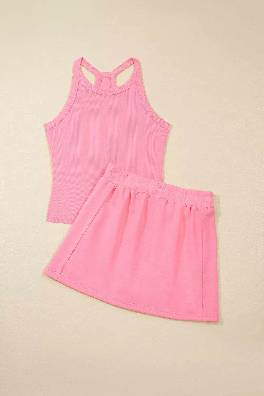 Shopimist sleeveless cropped top and pocketed skort set, casual summer outfit, lightweight fabric, stylish and comfortable for warm weather.
