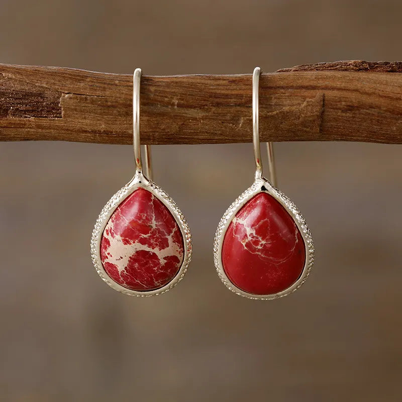 Copper natural stone teardrop earrings featuring a stylish design, perfect for fashion accessories and jewelry.