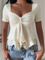 Sweetheart neck layered ruffle top from Trendsi, featuring a feminine design with ruffles and a flattering neckline.