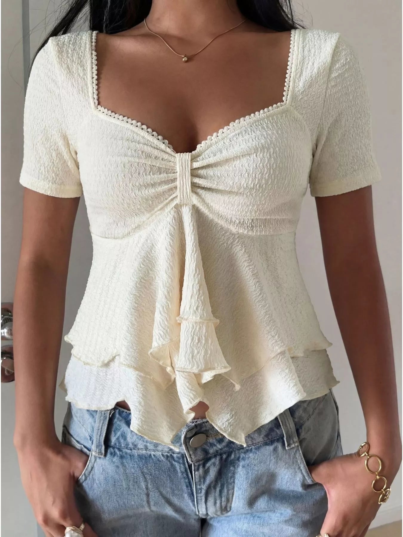 Sweetheart neck layered ruffle top from Trendsi, featuring a feminine design with ruffles and a flattering neckline.