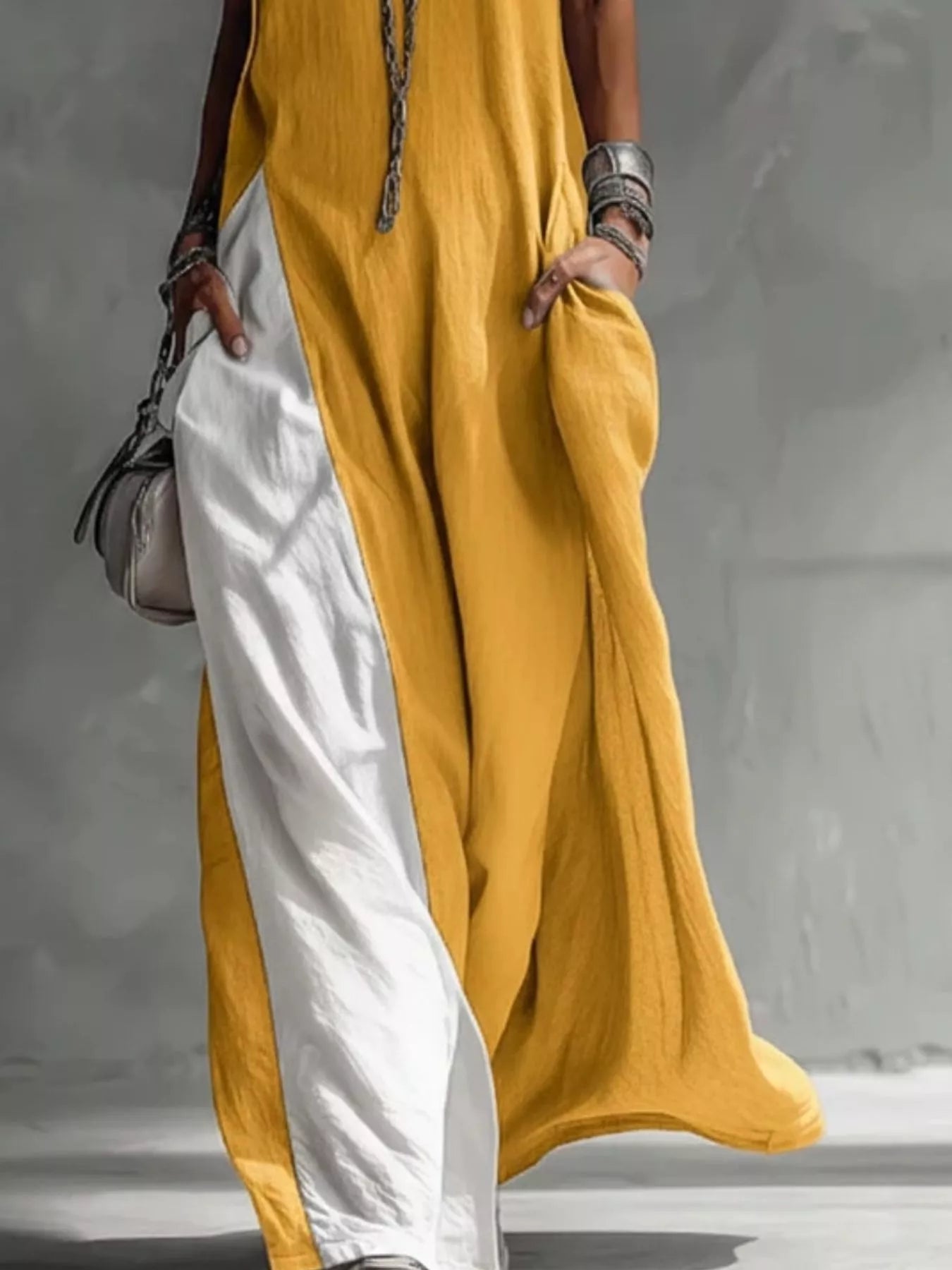 Two-tone sleeveless maxi dress by Plush Fashion Hub, elegant casual summer gown with a floor-length design and flowing fabric.