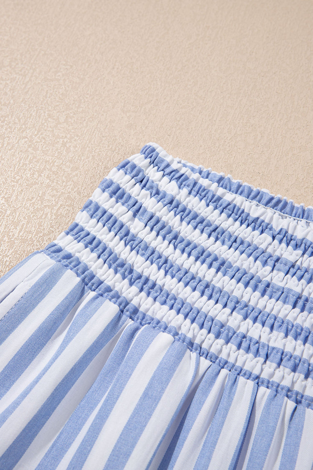 Light beige Brooke waist loose summer pants from Threaded Pear, featuring a relaxed fit and casual style.