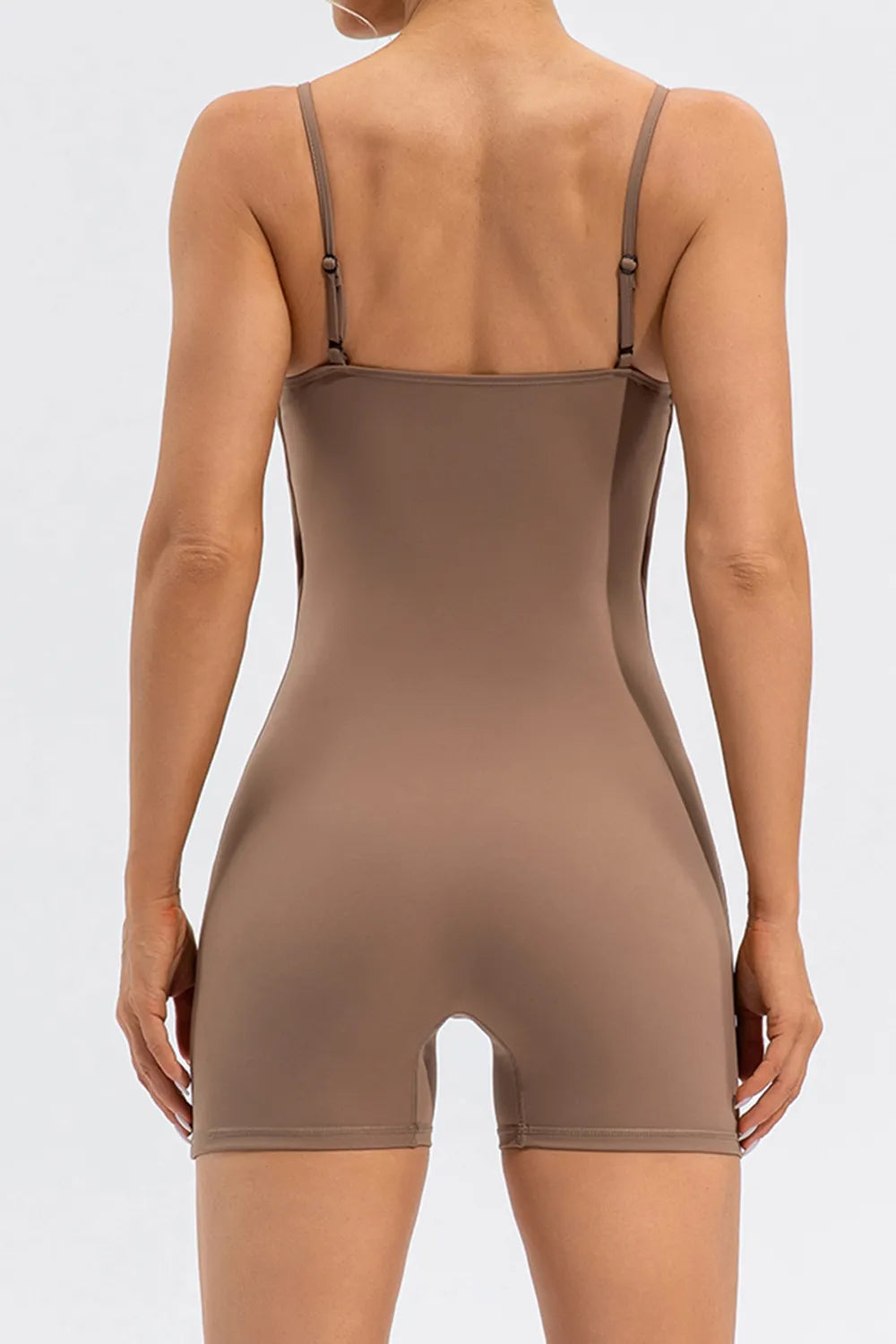 Trendsi activewear spaghetti strap round neck romper, lightweight and stylish for casual wear, shown in black fabric.