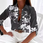 Women’s stripe print long-sleeve blouse by Plush Fashion Hub featuring a casual style with a relaxed fit and vibrant stripe pattern.