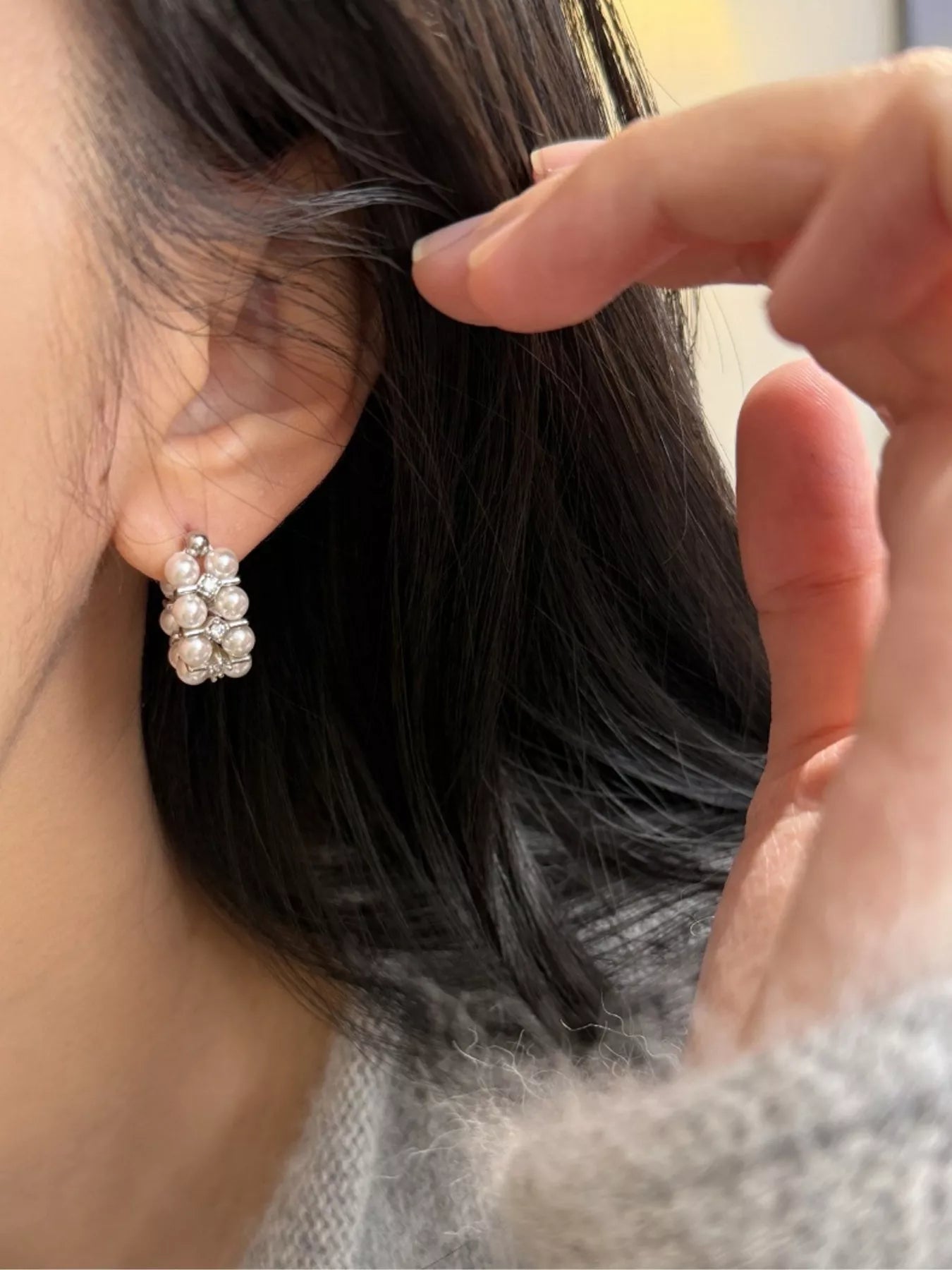 Pearl hoop earrings by Shopimist featuring elegant white pearls on gold-tone hoops, perfect for sophisticated styles.