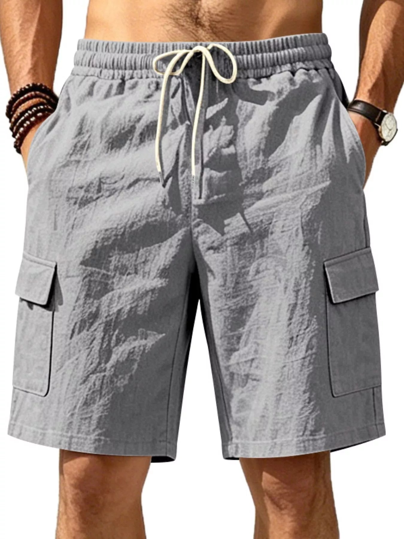Plus size men's casual cargo shorts with drawstring waist, displayed with multiple pockets and relaxed fit, by Trendsi.