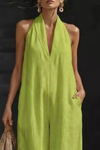 Women's sleeveless wide-leg jumpsuit with pockets by Trendsi, casual chic romper, shown in a stylish fit and design.