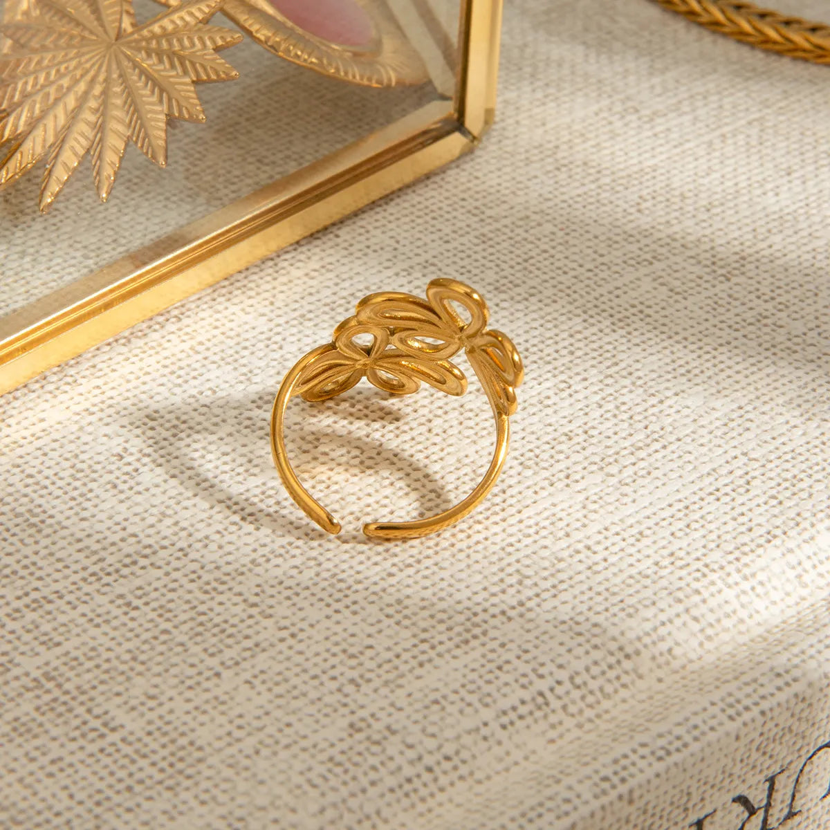 Silver stainless steel flower ring from Shopimist featuring a detailed floral design on a sleek band.