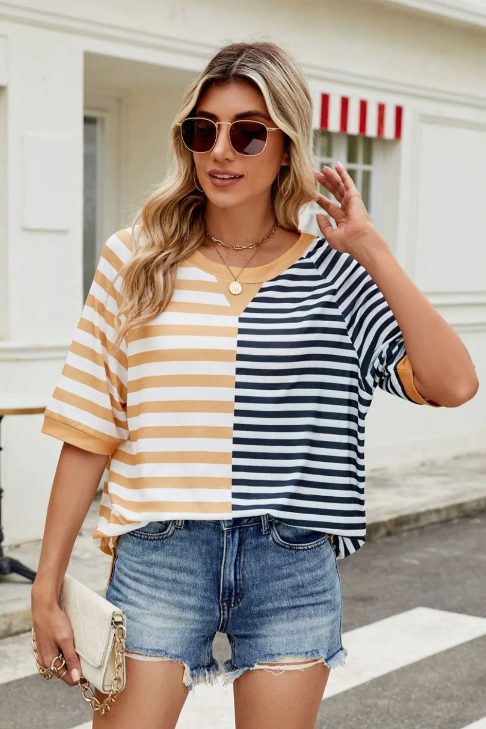 Striped round neck half sleeve T-shirt from Trendsi, casual tops with a classic fit and bold stripe pattern.