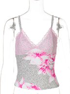 Women's leopard print cami top by Trendsi featuring delicate lace trim, stylish animal print, and lightweight sleeveless design.