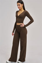 Fitglutes Activewear long sleeve crop top with fitted design and soft fabric, ideal for gym and workout sessions.