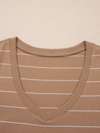 Women's striped short sleeve maxi T-shirt dress with side slit from Plush Fashion Hub, showing the relaxed fit and stylish design.