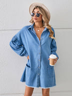 VYSN denim dress with button-up front, pocket details, and raw hem, showcasing casual and stylish clothing design.