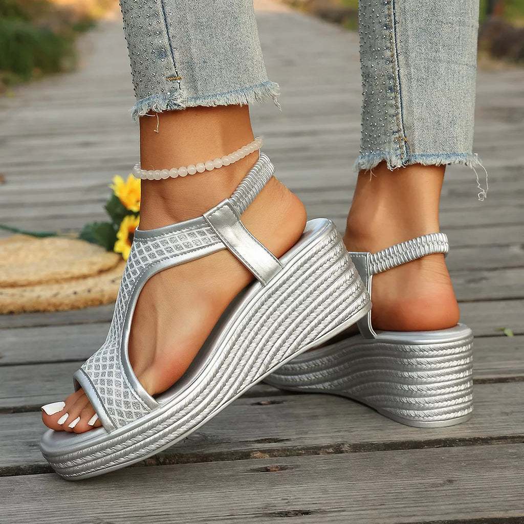 Open toe wedge sandals by Shopimist featuring a stylish design with a comfortable platform and ankle straps.
