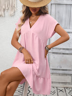 Women's casual V-neck mini dress with ruffle hem and ruched detailing, stylish Trendsi dress perfect for everyday wear.