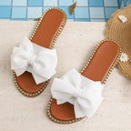 Shopimist bowknot embellished flat sandals featuring decorative bow details and comfortable flat sole for casual wear.