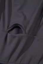Plush Fashion Hub active wear jumpsuit with cutout square neck and wide straps, designed for workout and casual wear.