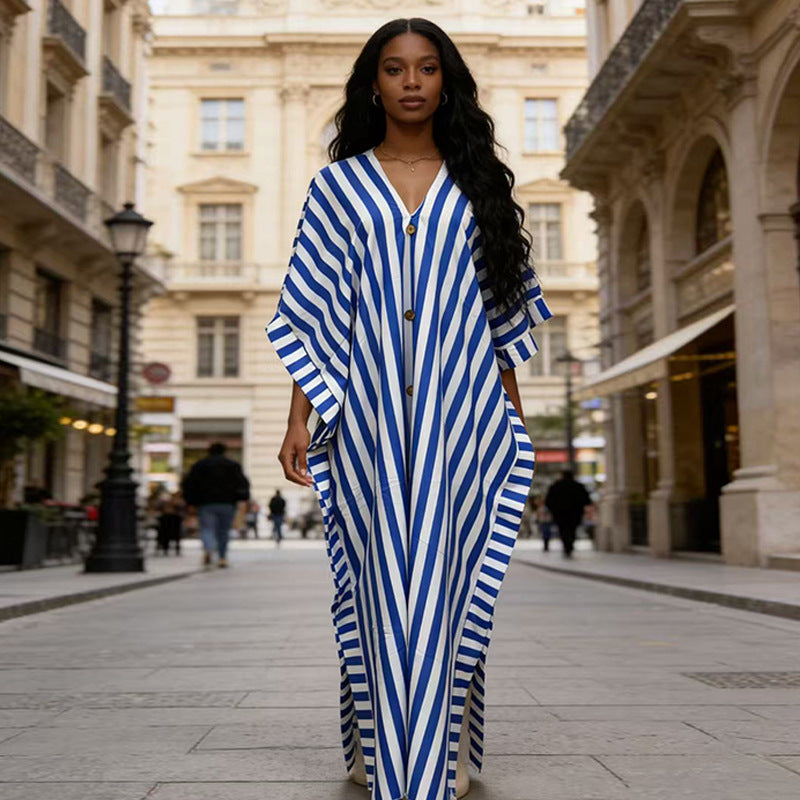 African-inspired striped loose long dress from Plush Fashion Hub in one size with five color options, featuring vibrant patterns and flowing fabric.