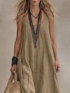 Plus size full-length maxi dress with scoop neck and sleeveless design by Shopimist, shown in a full view.