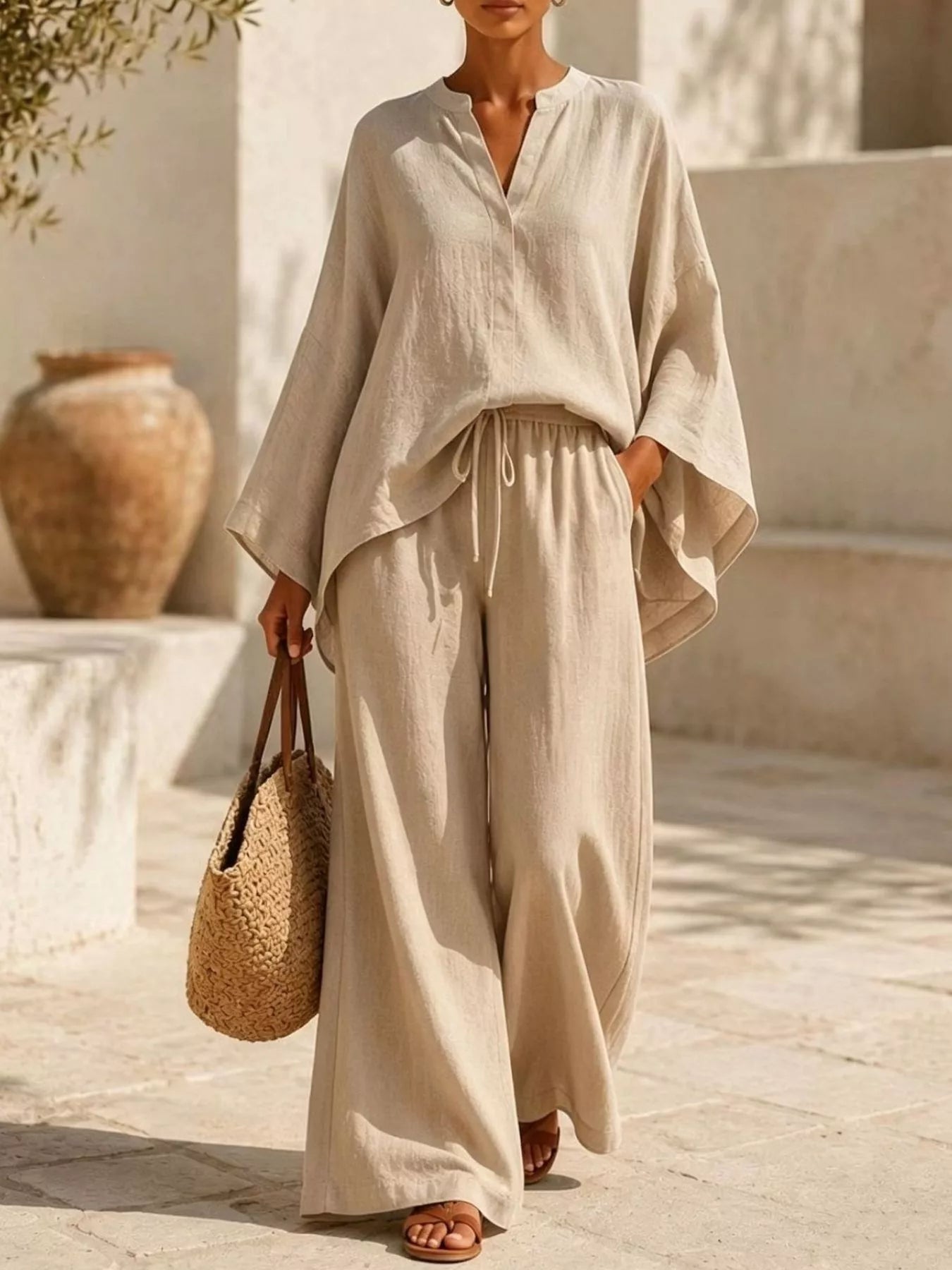 Plus size full notched long sleeve top and wide-leg pants loungewear set from Plush Fashion Hub, stylish and comfortable nightwear.