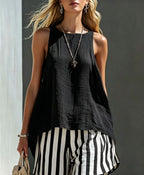 Women's V-neck long-sleeve loose-fit button-up shirt from FitiqueFit, shown in a relaxed fit with a V-neck and button details.