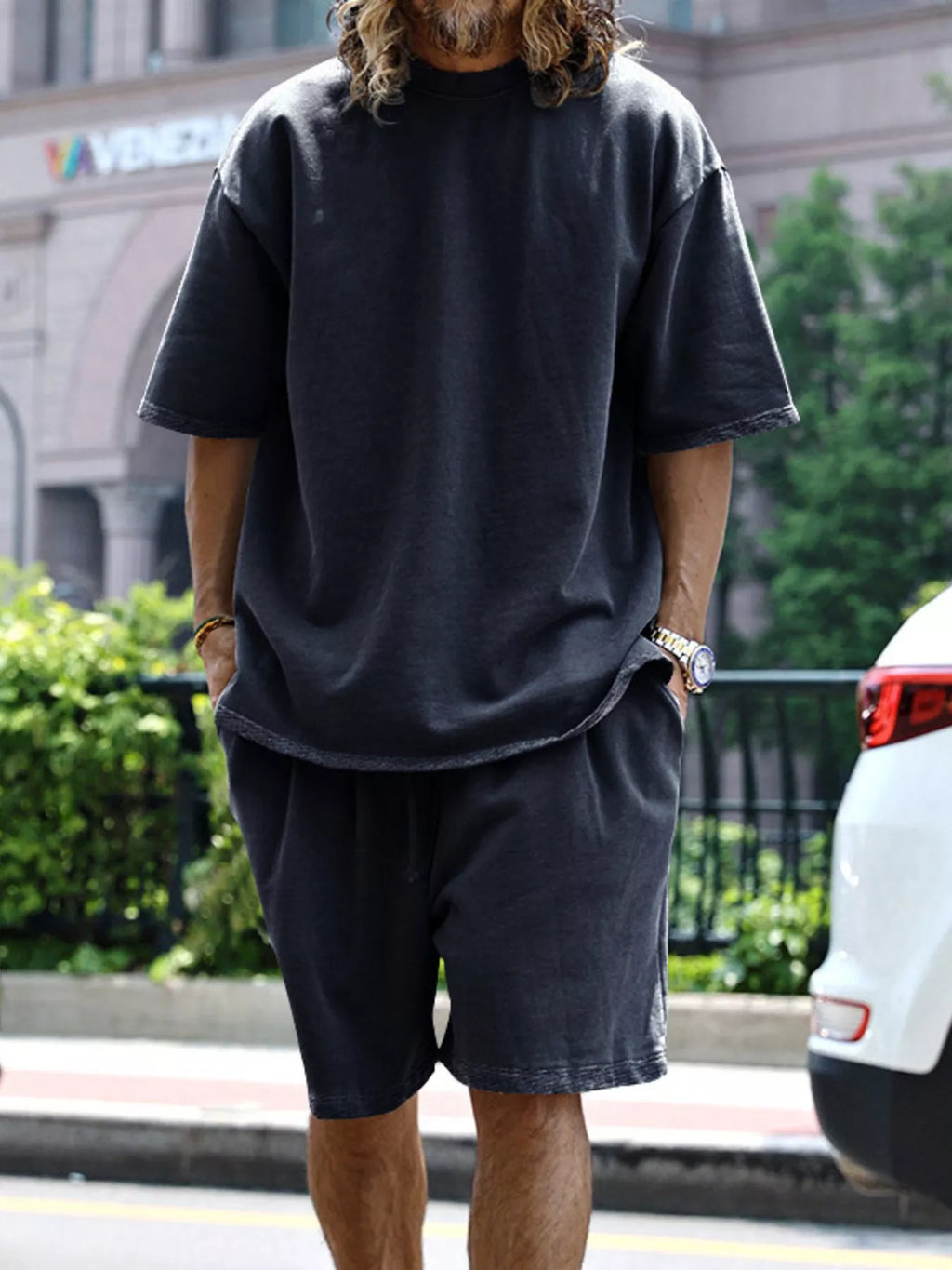 Plus size men's relaxed fit T-shirt and shorts set by Trendsi, casual tops and shorts outfit, comfortable and stylish for everyday wear.