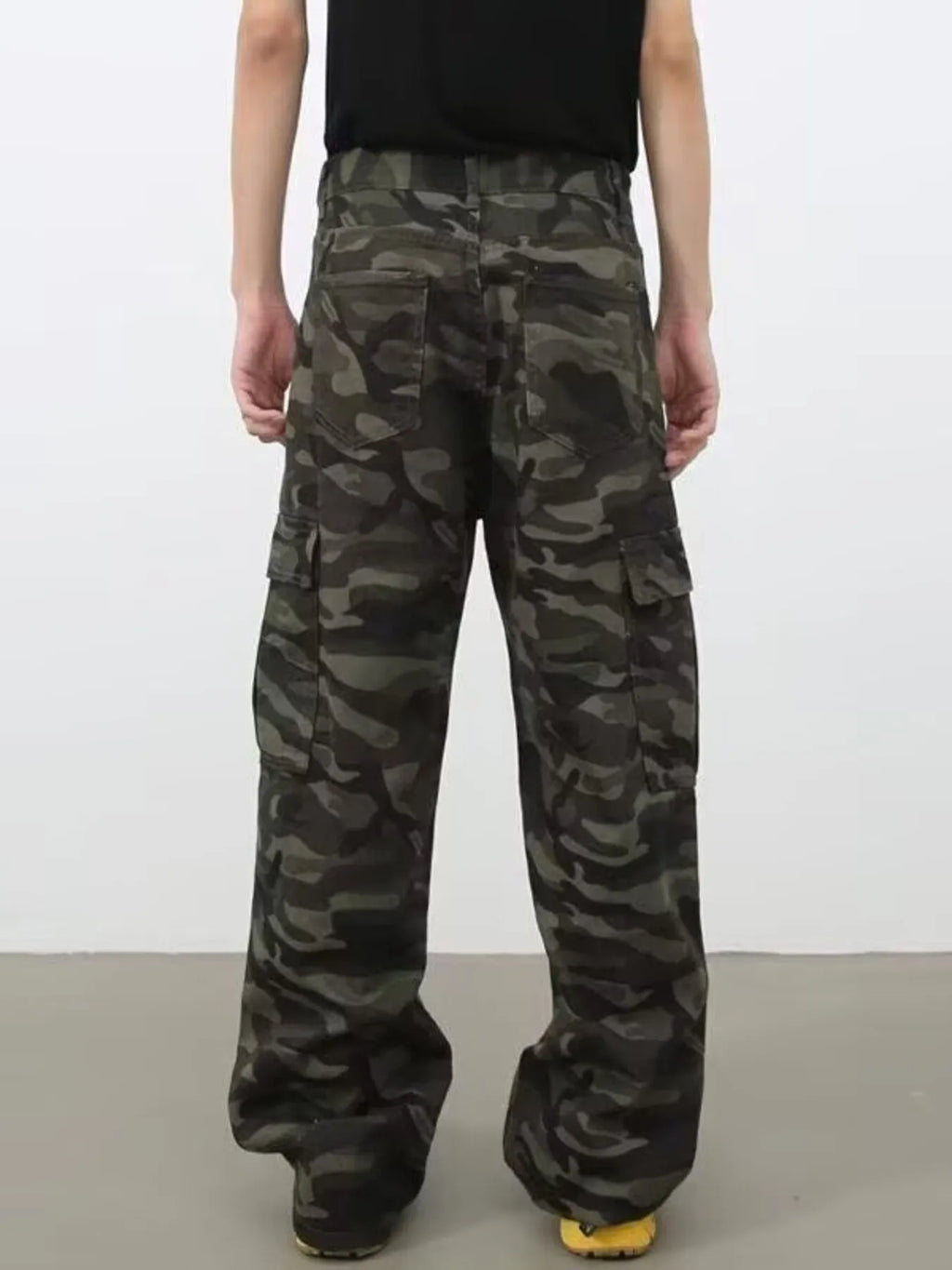 Men's camouflage print wide leg cargo jeans by Trendsi, plus size bottoms with a relaxed fit and functional pockets.
