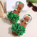 Shopimist floral decor flat sandals with colorful flower embellishments and comfortable slip-on design.