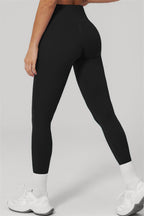 Fitglutes Activewear 2-piece tank top and leggings set, workout clothes designed for gym and sports activities, black color.