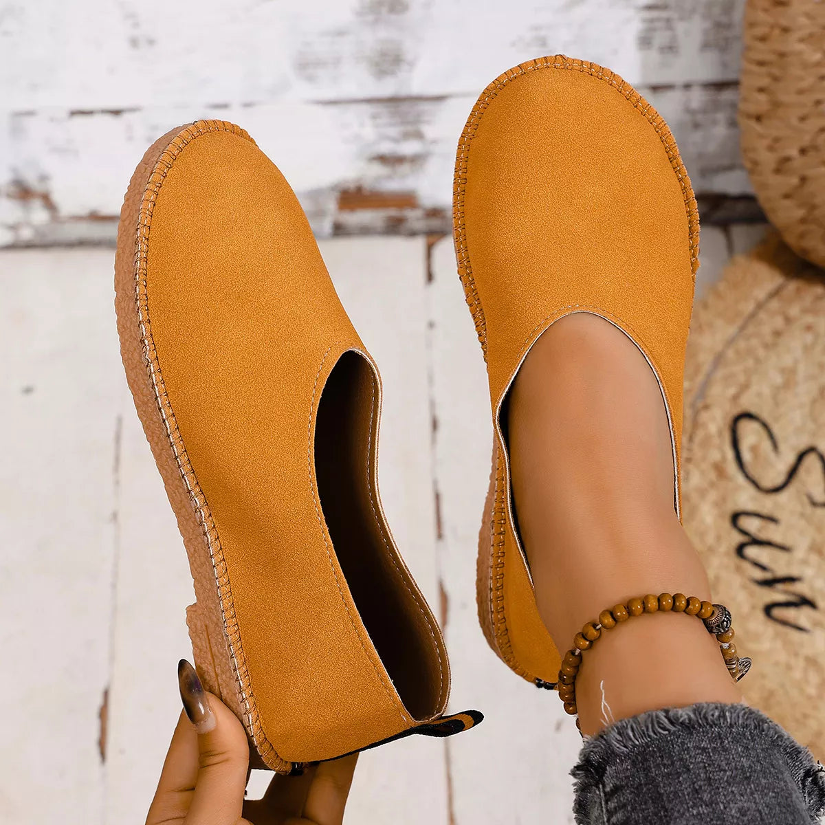 Shopimist round toe flats slip-ons with sleek design, featuring smooth material and comfortable slip-on style for everyday wear.