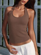 Ribbed halter neck tank top from Shopimist featuring a fitted design and sleeveless style, shown in a close-up image.