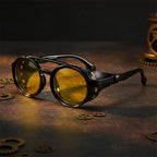 Retro round leather frame sunglasses with vintage style, featuring brown leather arms and dark tinted lenses.