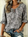 Women's floral print casual shirt with three-quarter sleeves from FitiqueFit, featuring a relaxed retro style.