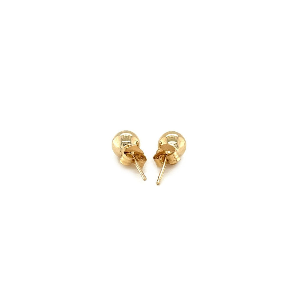 14k yellow gold round stud earrings, 5mm size, from Plush Fashion Hub, shown with shiny, polished gold finish and classic round shape.
