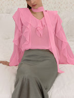Elegant chiffon blouse with ruffle trim and tie neck detail, stylish women’s top from Trendsi.