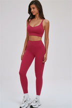Fitglutes Activewear sports bra and leggings set featuring a kinetic cross-back design, ideal for gym and workout sessions.