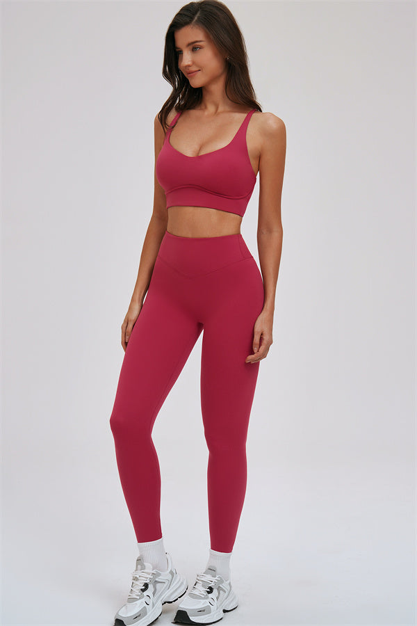 Fitglutes Activewear sports bra and leggings set featuring a kinetic cross-back design, ideal for gym and workout sessions.