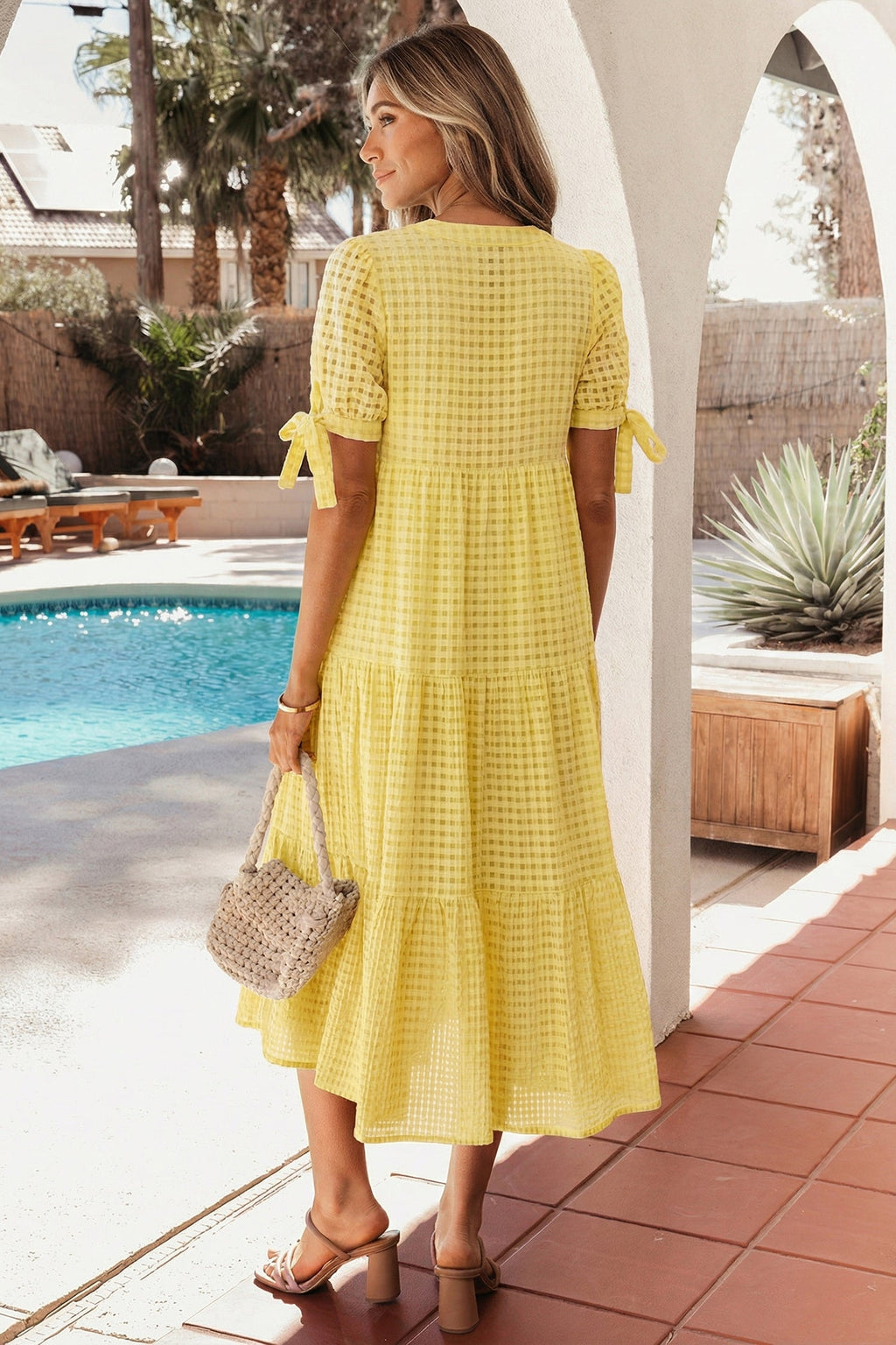 Skyla Sleeve Tiered Midi Dress by Threaded Pear featuring layered fabric and a feminine, flowing silhouette.