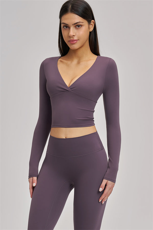 Fitglutes Activewear long sleeve crop top from The Swoon collection, featuring a fitted design and stylish workout apparel.