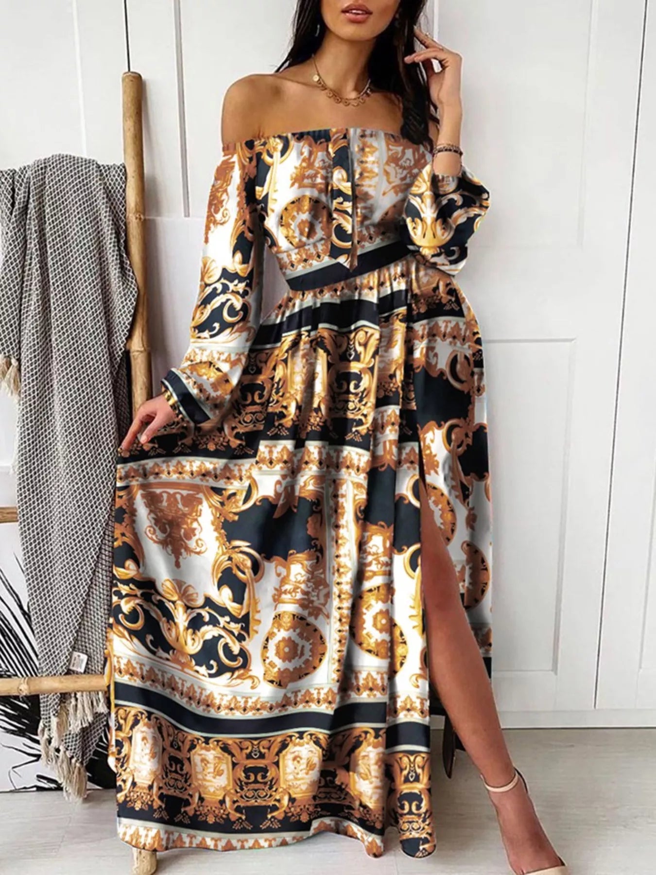 Printed off-shoulder maxi dress by Shopimist featuring a slit, lightweight fabric, and vibrant floral print, perfect for summer wear.