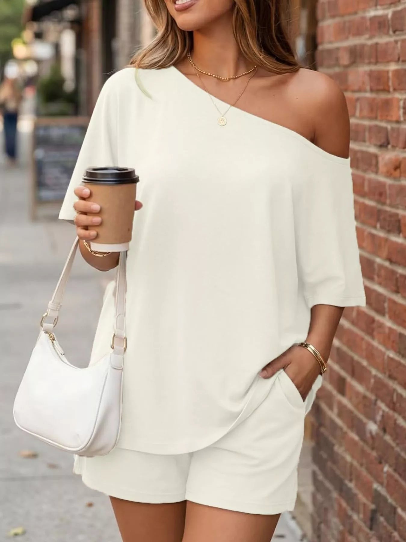Plus size plush fashion hub one-shoulder top and matching shorts set, casual and comfortable for warm weather.