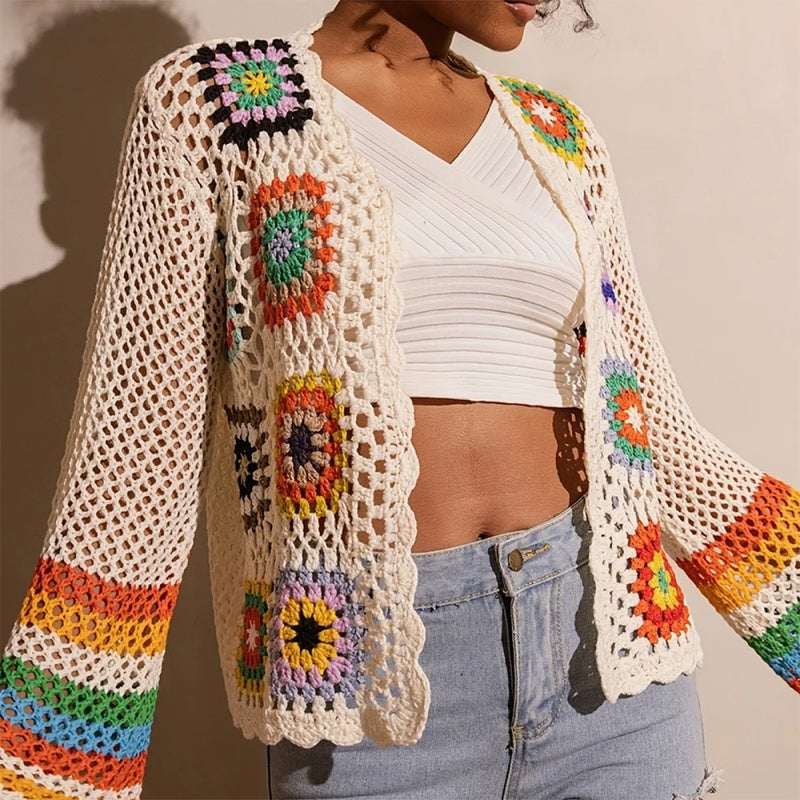 Women's elegant crochet cardigan by FitiqueFit featuring intricate knit pattern and lightweight, stylish design.
