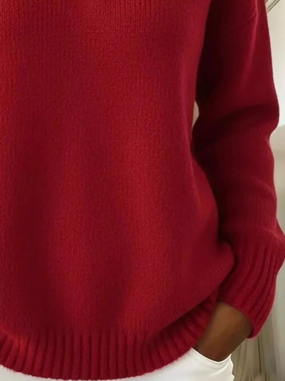 Plus size Trendsi button detail dropped shoulder sweater with a relaxed fit and cozy knit fabric, featuring decorative buttons on the shoulder.