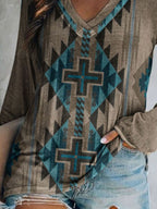 Plus size V-neck T-shirt with geometric print by Trendsi, featuring long sleeves and a comfortable casual fit.