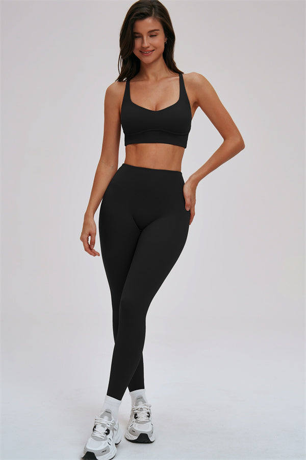 Fitglutes Activewear Kinetic Cross Back Sports Bra and Leggings 2-piece set, black workout clothes with supportive cross-back sports bra.